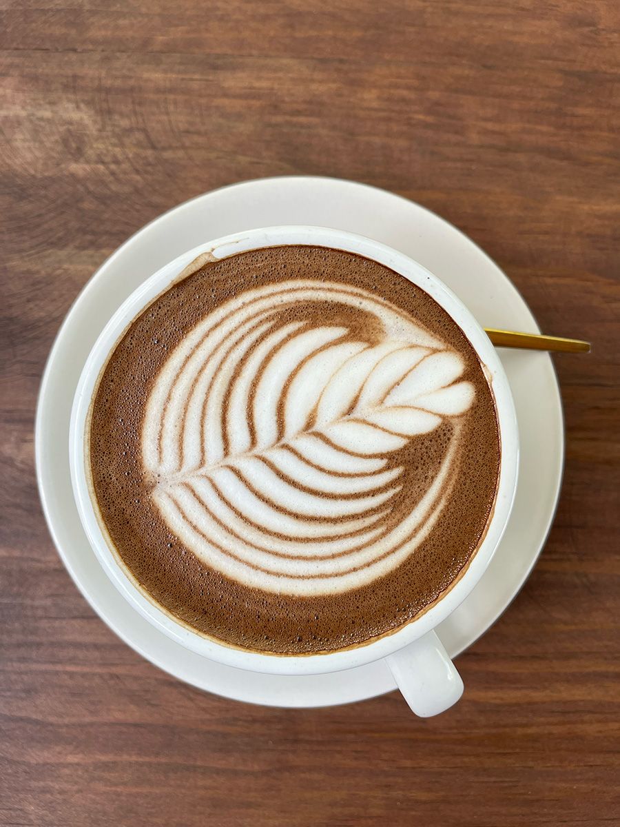 coffee with tree design as the foam