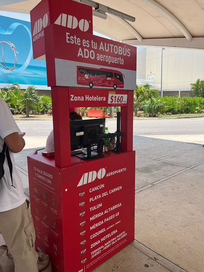 ADO Airport Ticket Booth red ticket booth with prices