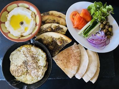 hummus platter with pita breaad and vegetables