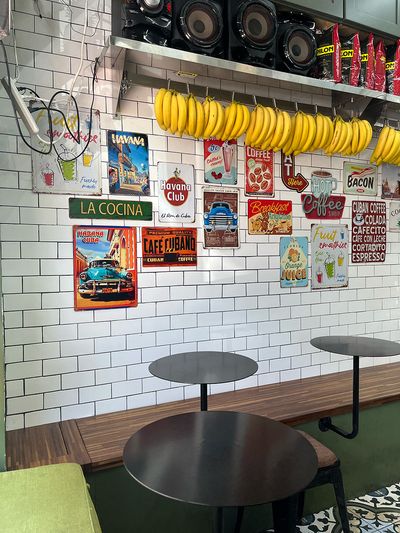Cuba Cafe in Miami Beach cafe interior with bananas hanging and cuban signs