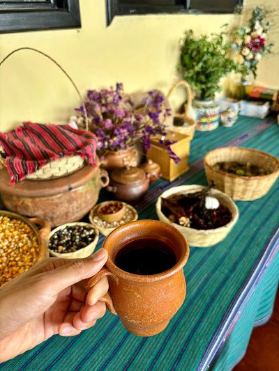 Traditionally served jamaica with local cooking ingredients traditional drink with cooking ingredients in background