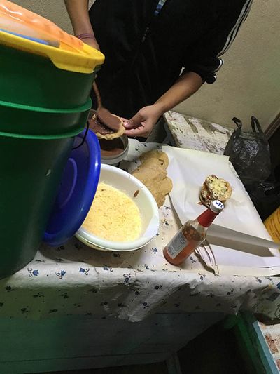 girl preparing garnaches