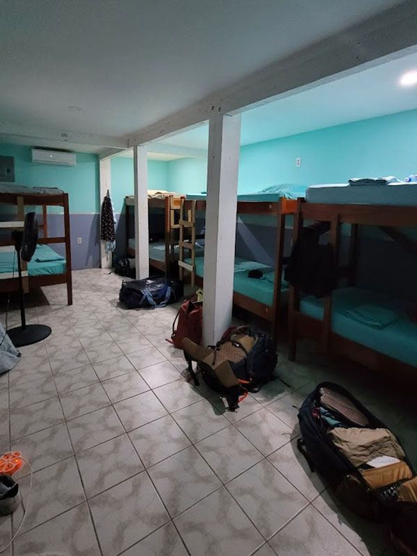 four bunk beds in spacious room with air conditioning