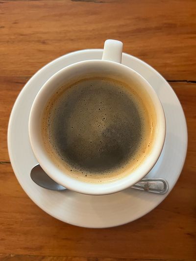 Kinta Café Bacalar foamy coffee on table