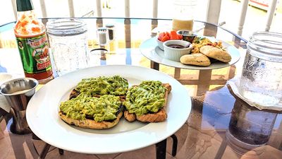 avocado toast on glass table