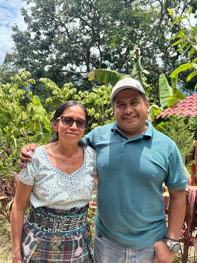 Maria and her husband Victor woman in traditional maya clothes and man beside her