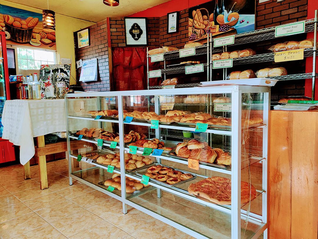 local bread displayed in wood shelf
