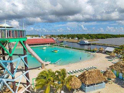 giant waterslide leading to artificial beach