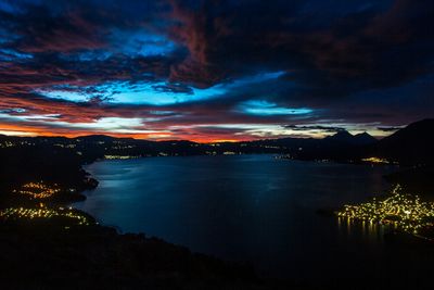 lake side at sunset with lights at night