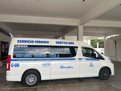 Terminal/Garage for Tulum to Bacalar/Chetumal Colectivo white shuttle bus garage