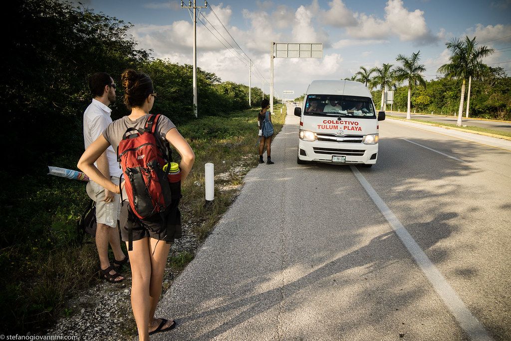 van with tourists by roadside