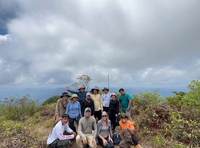 group shot of hikers at the top of summit