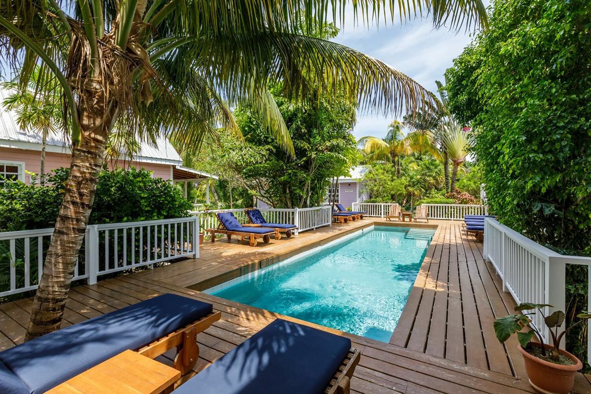 lap pool with chairs around it