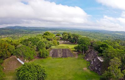 top view small mayan ruin with lush forest